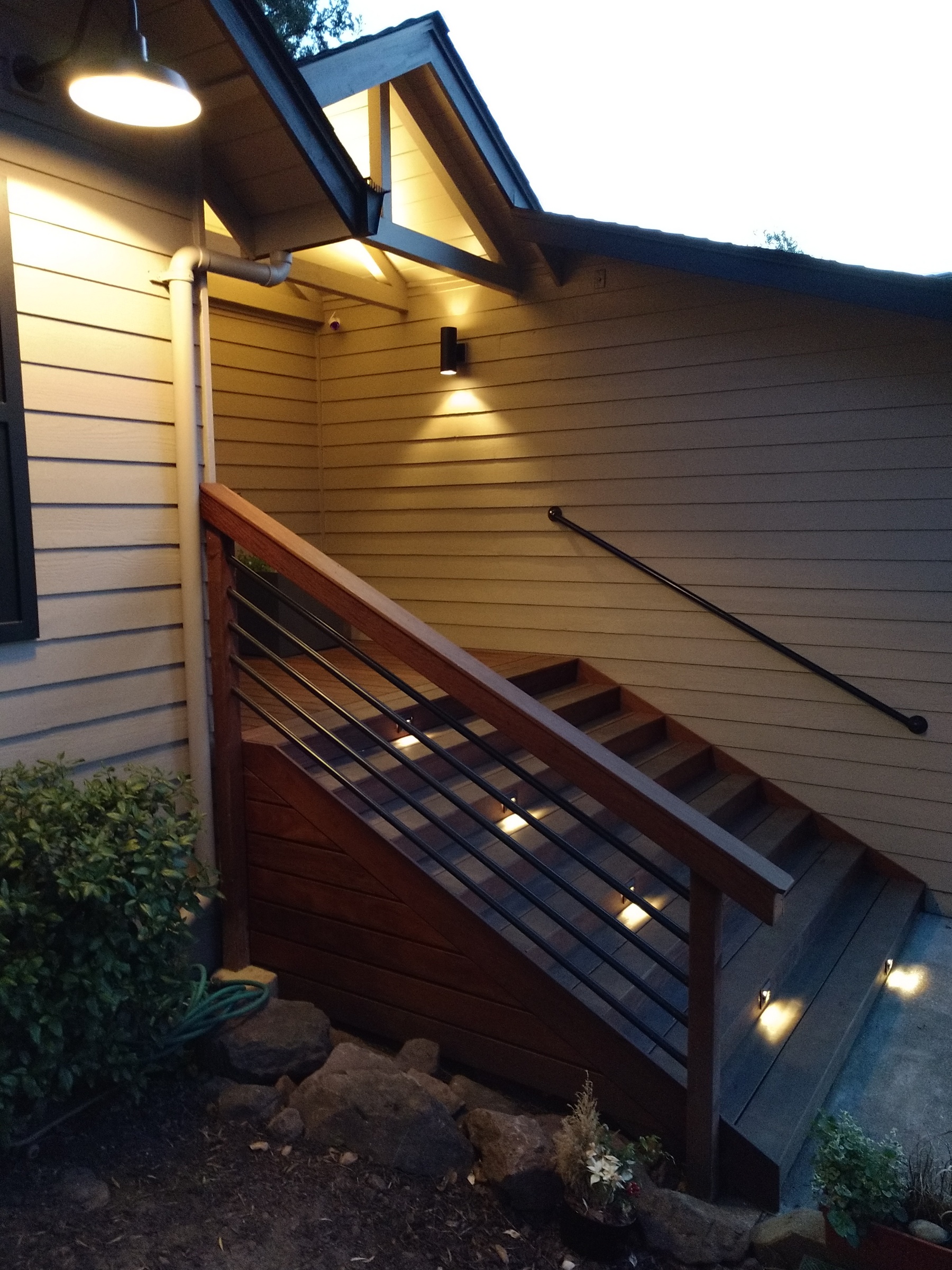 Remodeled entry - roof, deck, railing, lighting